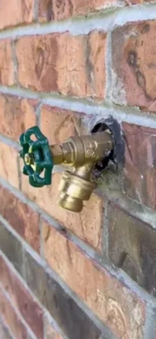 New brass hose bib — installed